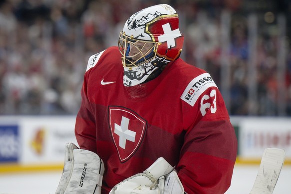 Switzerland&#039;s Goalkeeper Leonardo Genoni reacts during the Ice Hockey World Championship semi final match between Switzerland and Canada in Prague at the O2 Arena, Czech Republic, on Saturday, Ma ...