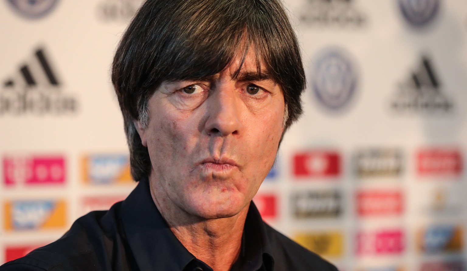 epa07439379 Joachim Loew, head coach of the German national soccer team, announces the squad for the upcoming matches during a press conference in Frankfurt Main, Germany, 15 March 2019. Germany will  ...