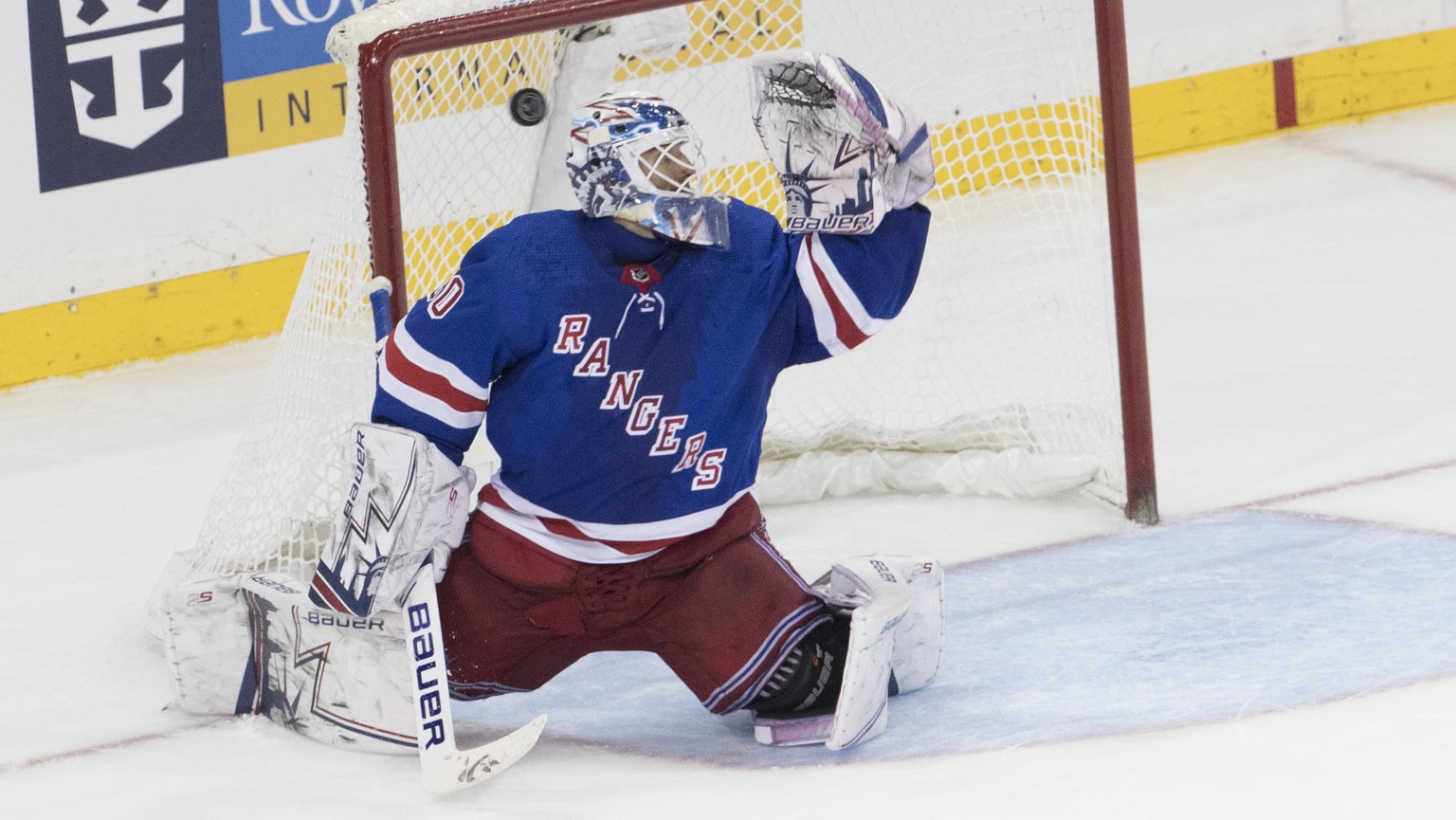 Arizona Coyotes defenseman Oliver Ekman-Larsson, not shown, scores a goal past New York Rangers goaltender Henrik Lundqvist to tied the game during the third period of an NHL hockey game, Friday, Dec. ...