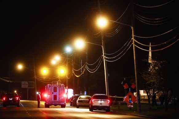 Police operate at a crime scene outside the Cameo Nightclub after a reported fatal shooting, Sunday, March 26, 2017, in Cincinnati. At least two people opened fire inside a crowded nightclub early Sun ...