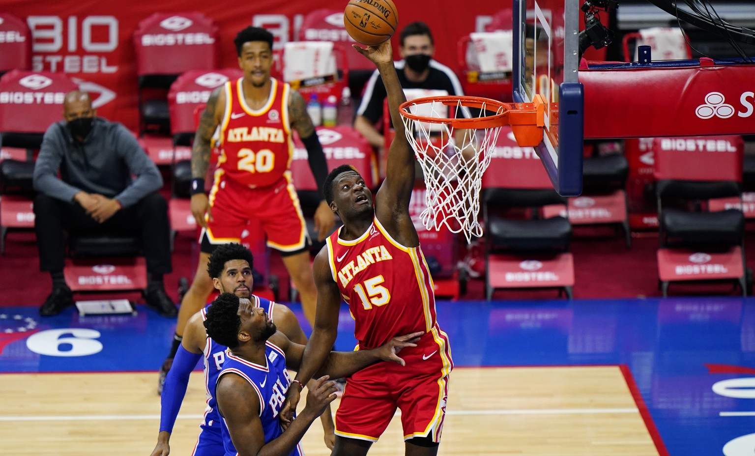 Atlanta Hawks&#039; Clint Capela, right, goes up for a shot against Philadelphia 76ers&#039; Joel Embiid during the first half of an NBA basketball game, Friday, April 30, 2021, in Philadelphia. (AP P ...