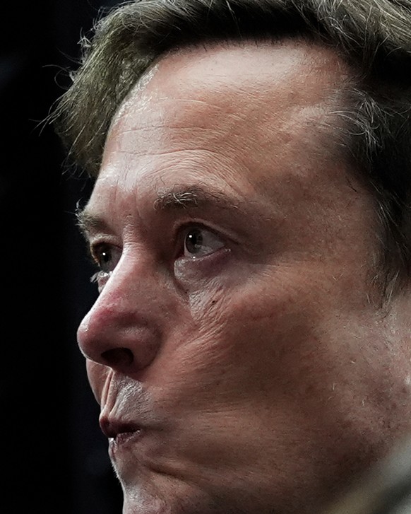 FILE - Elon Musk attends a memorial for conservative activist Charlie Kirk, Sunday, Sept. 21, 2025, at State Farm Stadium in Glendale, Ariz. (AP Photo/Julia Demaree Nikhinson)
Top Vertical Photos Phot ...