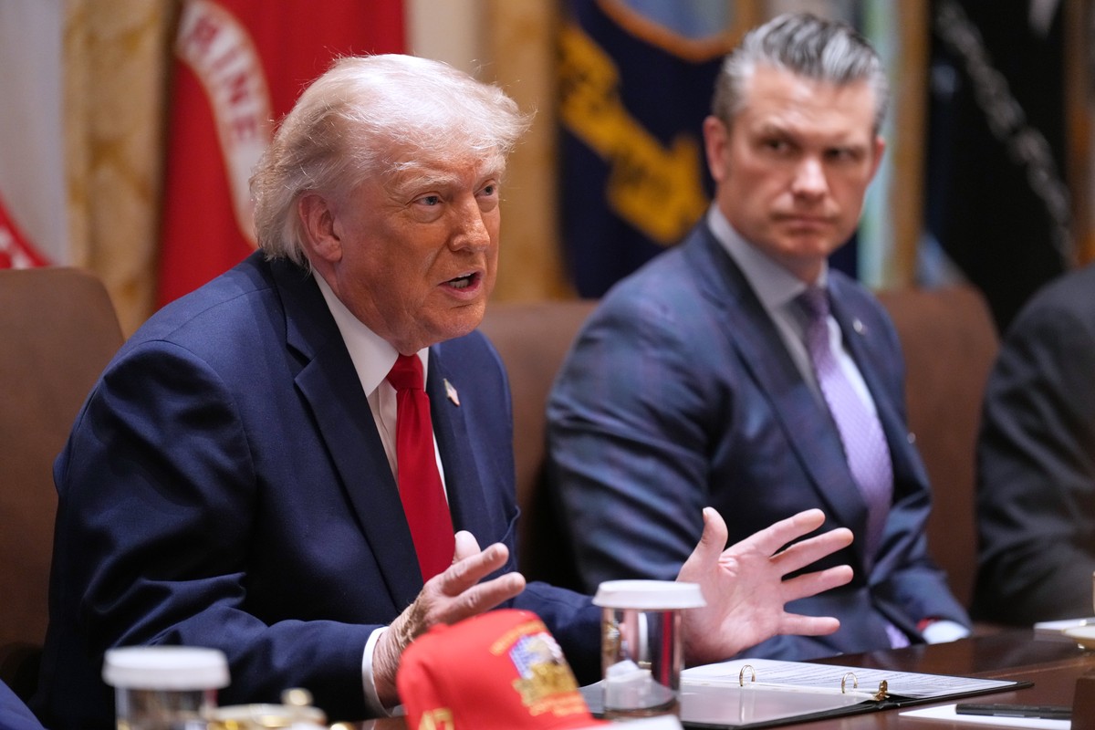 President Donald Trump speaks during a Cabinet meeting at the White House, Wednesday, May 27, 2026, in Washington, as Secretary of Defense Pete Hegseth, looks on. (AP Photo/Jacquelyn Martin)
Donald Tr ...