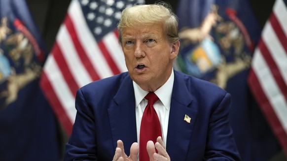 FILE - Republican presidential candidate former President Donald Trump speaks at a campaign event in Grand Rapids, Mich., Tuesday, April 2, 2024. Trump filed a law suit on March 24, suing two co-found ...