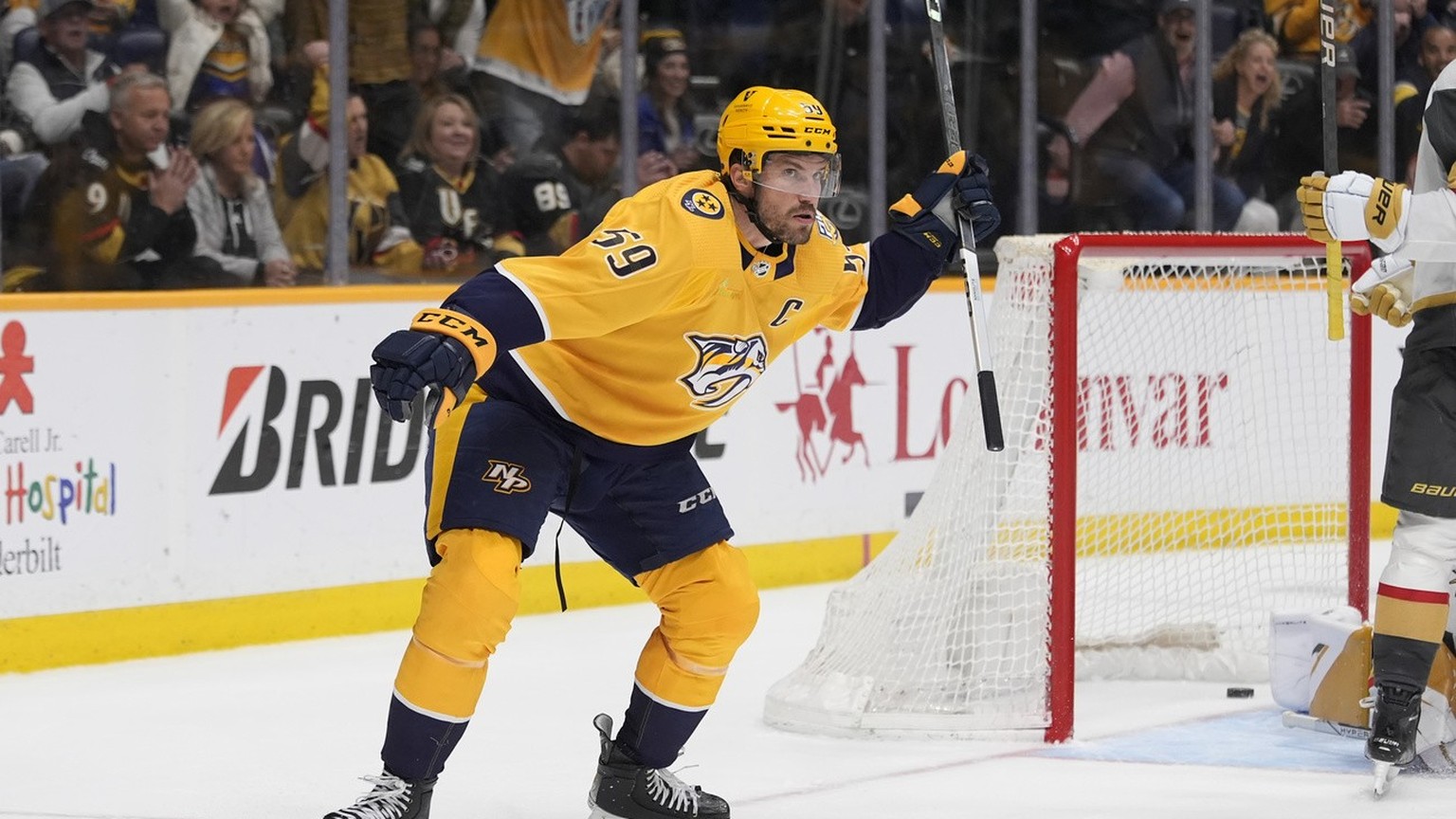 Nashville Predators defenseman Roman Josi (59) celebrates his game winning goal at the end of overtime in an NHL hockey game against the Vegas Golden Knights, Tuesday, March 26, 2024, in Nashville, Te ...