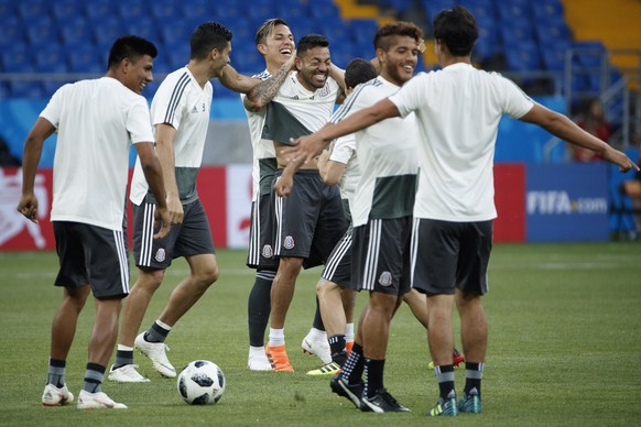epa06831587 Mexico's Marco Fabian (C) jokes with teammates during a training session in Rostov-on-Don, Russia 22 June 2018. Korea Republic will play Mexico in their FIFA World Cup 2018 Group F ma ...