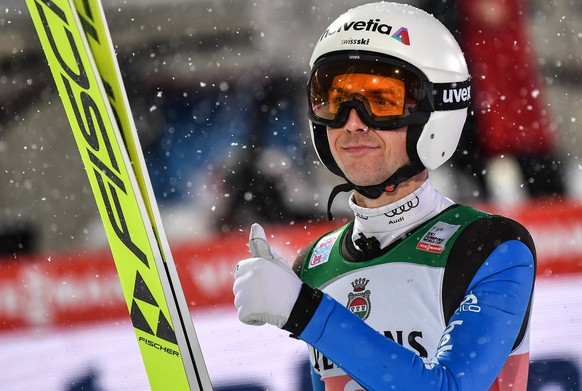 epa08908028 Simon Ammann of Switzerland reacts during the qualification of the first stage of the 69th Four Hills Tournament in Oberstdorf, Germany, 28 December 2020. EPA/LUKAS BARTH-TUTTAS