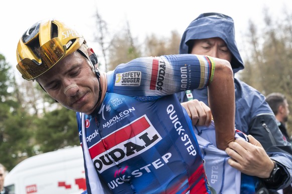 Remco Evenepoel from Belgium of team Soudal Quick-Step puts on a warm jacket after the fourth stage, a 118,2 km race between Sion and Thyon 2000 at the 78th Tour de Romandie UCI World Tour Cycling rac ...