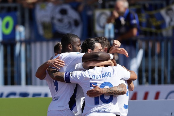 Italian soccer Serie A match - Empoli FC vs Inter - FC Internazionale Empoli s Romanian midfielder Razvan Marin challenges for the ball with Inter�&amp; x80&amp; x99s Italian defender Federico Dimarco ...