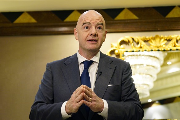 FILE - FIFA President Gianni Infantino speaks during an interview conducted with The Associated Press in Doha, Qatar, March 29, 2022. Infantino said migrant workers gain pride from hard work when he w ...