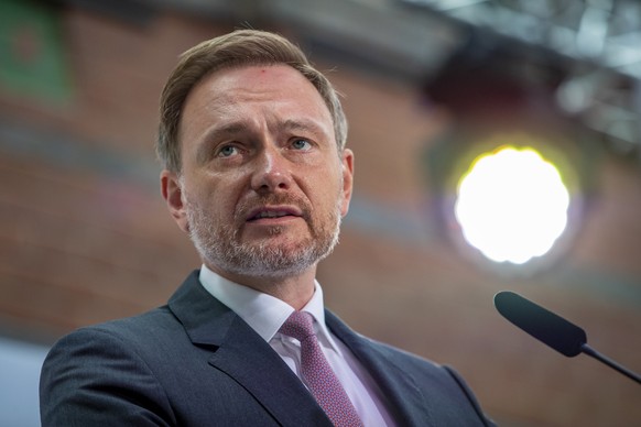 epa09491357 Christian Lindner, lead candidate of the German Free Democrats (FDP), speaks during a FDP party press conference in Berlin, Germany, 27 September 2021, a day after the German general elect ...