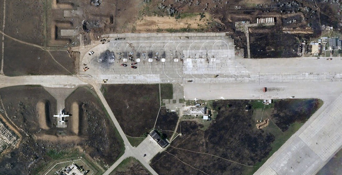 This satellite image provided by Planet Labs PBC shows destroyed Russian aircraft at Saki Air Base after an explosion Tuesday, Aug. 9, 2022, in the Crimean Peninsula, the Black Sea peninsula seized fr ...