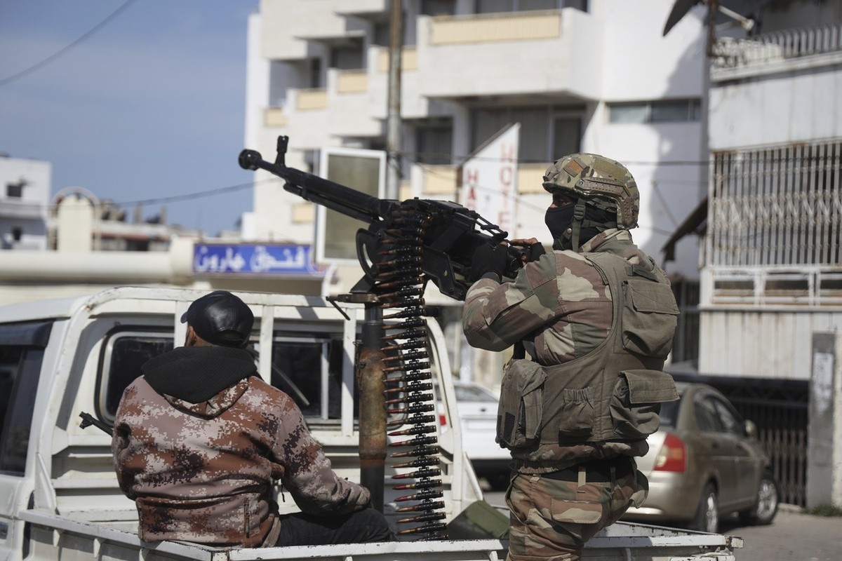 Reinforcement Syrian security forces deploy in Latakia, Syria, Friday, March 7, 2025.