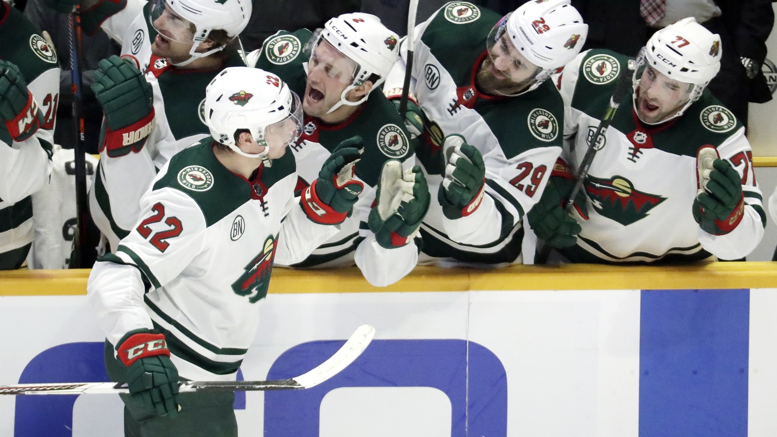 Minnesota Wild right wing Kevin Fiala (22), of Switzerland, is congratulated after scoring his second goal of the game against the Nashville Predators in the third period of an NHL hockey game Tuesday ...