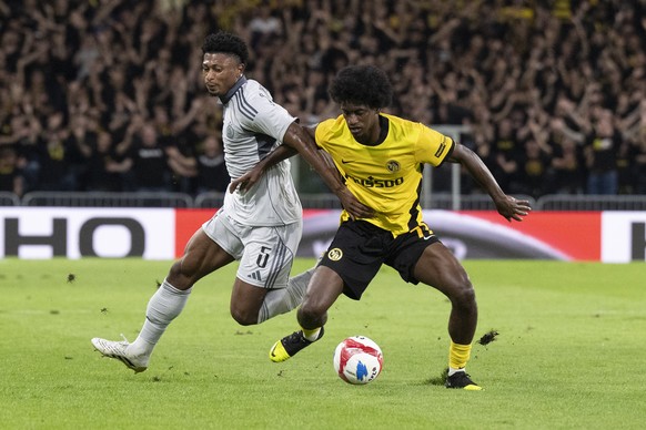 YB&#039;s Joel Monteiro, right, fights for the ball with Slovan&#039;s Rahim Ibrahim during the UEFA Europa League playoff 2nd leg match between BSC Young Boys of Switzerland and Slovan Bratislava of  ...