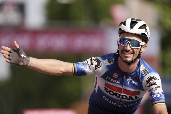 France&#039;s Julian Alaphilippe celebrates winning the 12th stage of the Giro d&#039;Italia cycling race from Martinsicuro to Fano, Italy, Thursday, May 16, 2024. (Massimo Paolone/LaPresse via AP)