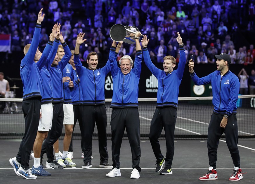 epa07042548 Team Europe&#039;s captain Bjorn Borg (C) celebrates with his team after winning the Laver Cup against Team World at the United Center in Chicago, Illinois, USA, 23 September 2018. EPA/KAM ...