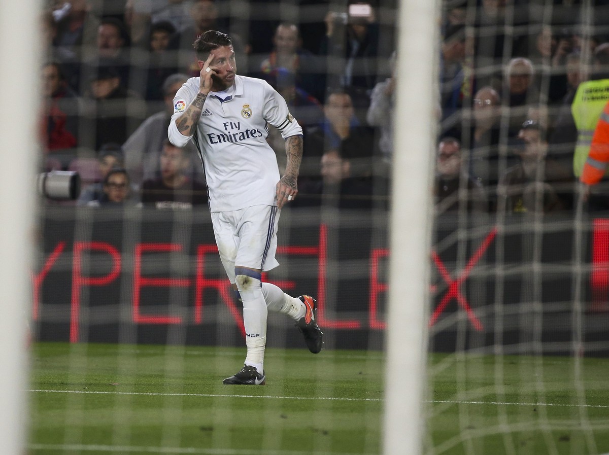 Football Soccer - Barcelona v Real Madrid - Spanish La Liga Santander- Nou Camp Stadium, Barcelona, Spain - 3/12/16. Real Madrid's Sergio Ramos celebrates after scoring a goal during the "Cl ...