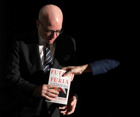 epa06542371 US writer Michael Wolff present the Spanish edition of his book &#039;Fire and Fury&#039; that is based on the testimonies of senior White House officials on US President Donald Trump, in  ...