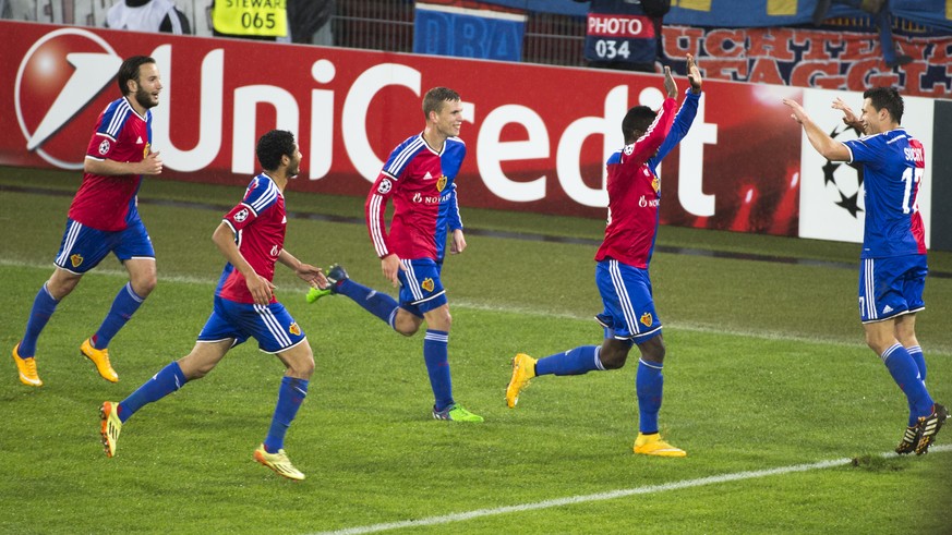 Basel&#039;s Marek Suchy, Basel&#039;s Breel Embolo, Basel&#039;s Fabian Frei, Basel&#039;s Mohamed Elneny and Basel&#039;s Shkelzen Gashi, from right to left, celebrate the 4:0 during an UEFA Champio ...