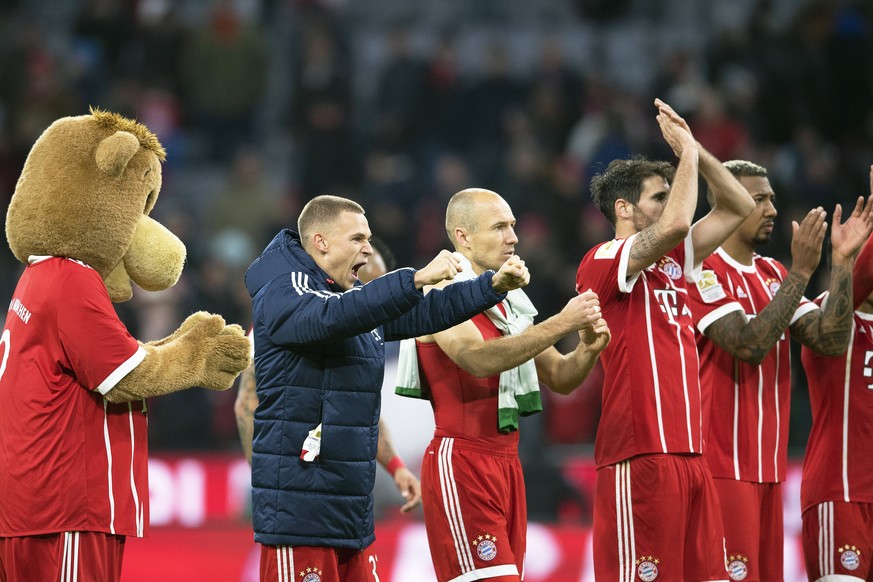 epa06295769 Bayern Munich players (2-L to R) Joshua Kimmich, Arjen Robben, Javi Martinez, and Jerome Boateng celebrate after the German Bundesliga soccer match between FC Bayern Munich and RB Leipzig  ...