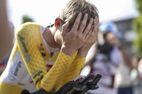 Denmark&#039;s Mattias Skjelmose reacts after winning the Tour de Suisse, during the eighth and final stage, a 25,7 km individual time trial, from St. Gallen to Abtwil, at the 86th Tour de Suisse cycl ...
