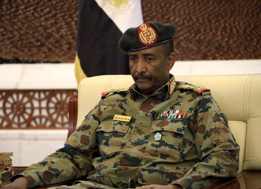 epa09544871 (FILE) - Leader of Sudan&#039;s transitional council, Lieutenant General Abdel Fattah Abdelrahman Burhan looks on after being sworn in as the Head of the newly formed transitional Council  ...