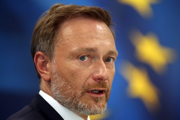 epa10012204 German Finance Minister Christian Lindner delivers a statementto the media after his meeting with his Greek counterpart Staikouras in Athens, Greece, 14 June 2022. Lindner is in Athens on  ...