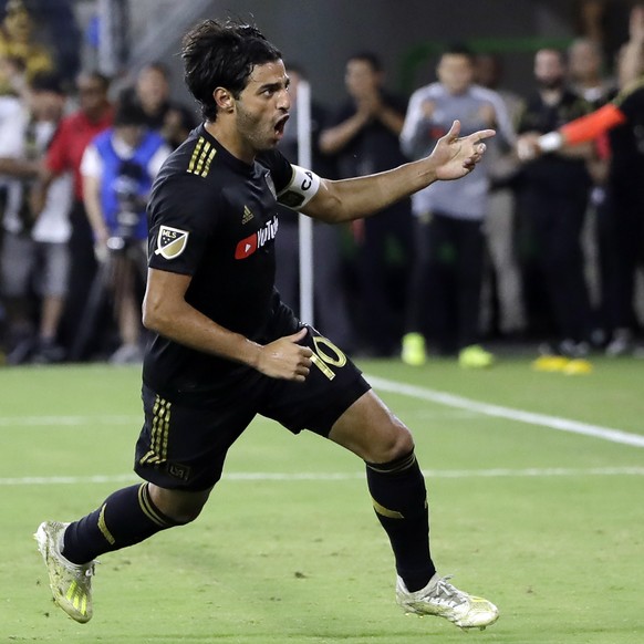FILE - Los Angeles FC&#039;s Carlos Vela (10) celebrates after scoring against the Los Angeles Galaxy during the second half of an MLS soccer match in Los Angeles, in this Sunday, Aug. 25, 2019, file  ...