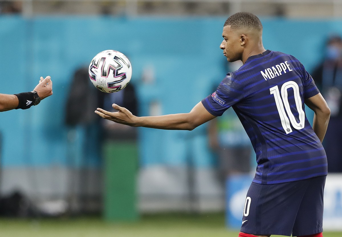 France's Kylian Mbappe takes the ball during a penalty shootout at the end of the Euro 2020 soccer championship round of 16 match between France and Switzerland at the National Arena stadium in B ...