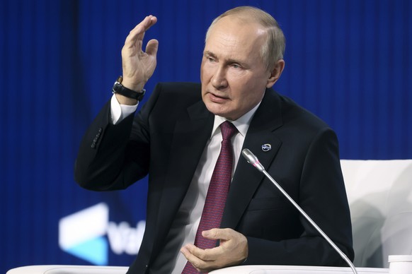 Russian President Vladimir Putin gestures while speaking at the plenary session of the 19th annual meeting of the Valdai International Discussion Club outside Moscow, Russia, Thursday, Oct. 27, 2022.  ...