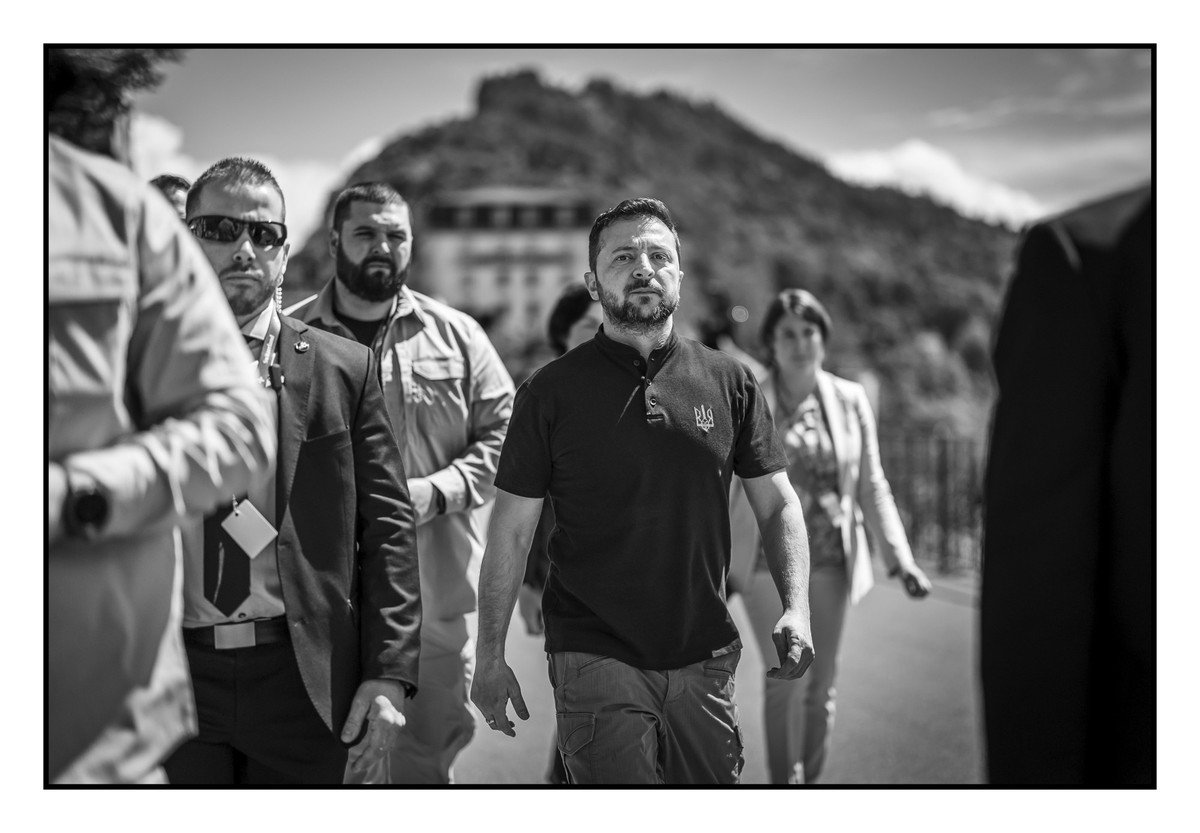 Ukrainian President Volodymyr Zelenskyy, center, on his way during the Summit on peace in Ukraine, in Stansstad near Lucerne, Switzerland, Sunday, June 16, 2024. Heads of state from around the world g ...