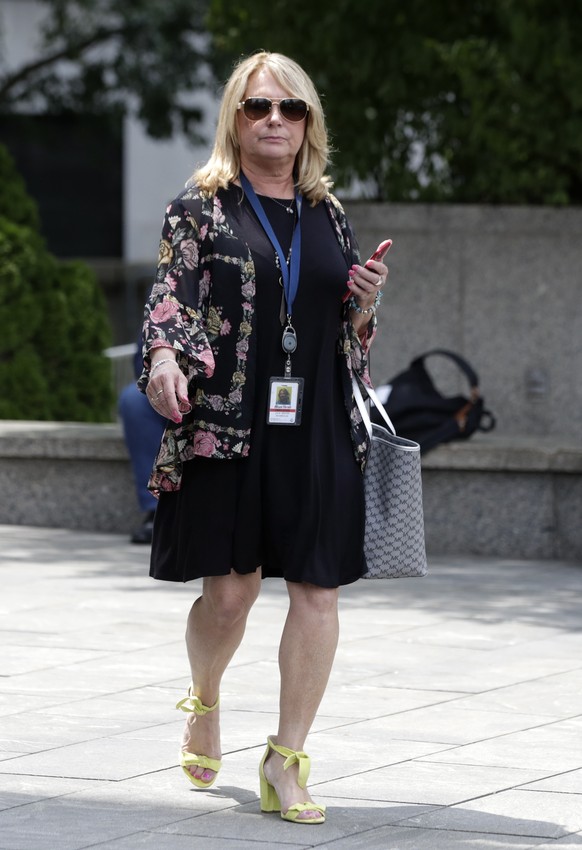 epa07704222 Miami Herald reporter Julie K. Brown, who has done the original reporting regarding the alleged sex trafficking crimes, is seen outside the United States Federal Court in New York, New Yor ...
