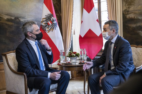 Swiss Federal President Ignazio Cassis, right, welcomes Karl Nehammer, Chancellor of Austria, to an official visit, in Zofingen, Switzerland, on Monday, February 14, 2022. (KEYSTONE/Alessandro della V ...