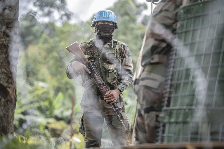 MONUSCO blue helmet deployed near Kibumba, north of Goma, Democratic Republic of Congo, Saturday Jan. 28, 2022. Thousands of people in the Democratic Republic of Congo have been displaced after they f ...