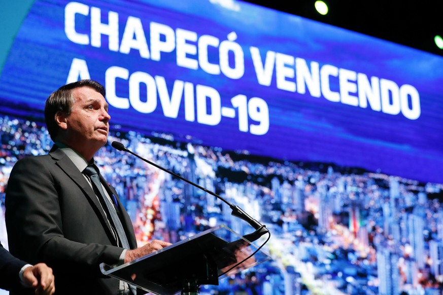 epa09121277 A handout photo made available by the Presidency of Brazil shows President Jair Bolsonaro during his visit at the Covid-19 Advanced Service Center, in Chapeco, a city in the state of Santa ...