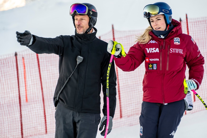Lindsey Vonn, right, of the United States, and Coach and former Norwegian skier Aksel Lund Svindal, left, talk before the women&#039;s Downhill training race at the Alpine Skiing FIS Ski World Cup in  ...