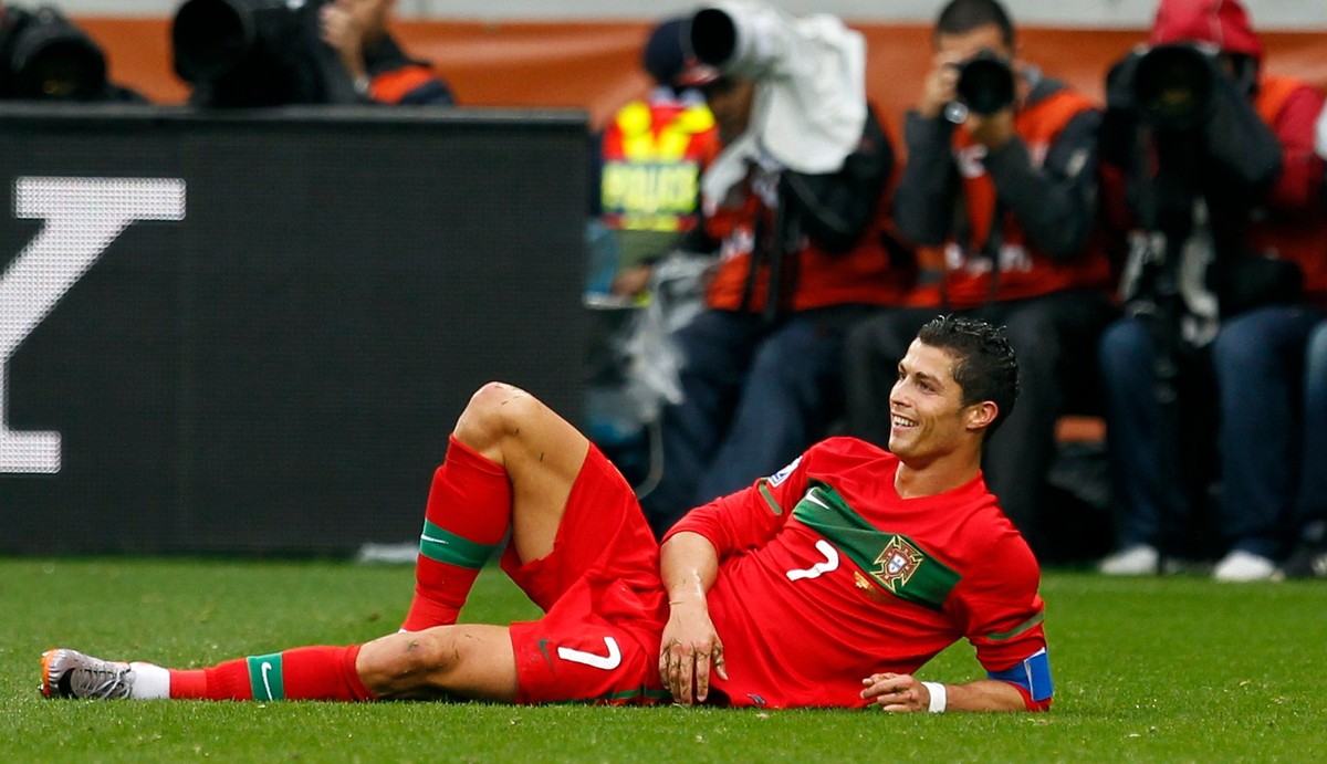FILE - Portugal's Cristiano Ronaldo smiles during the World Cup group G soccer match against North Korea in Cape Town, South Africa, June 21, 2010. Portugal won 7-0. (AP Photo/Armando Franca, Fil ...