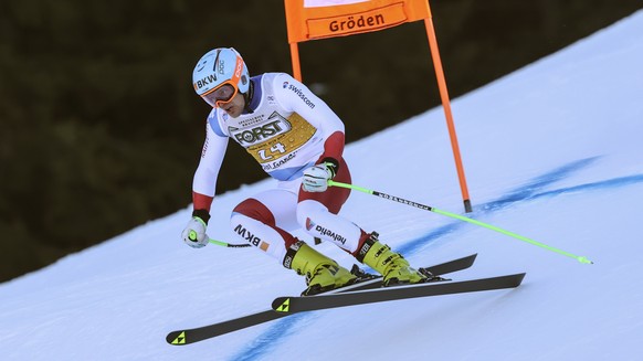 Switzerland&#039;s Stefan Rogentin speeds down the course during an alpine ski, men&#039;s World Cup downhill training, in Val Gardena, Italy, Thursday, Dec. 16, 2021. (AP Photo/Alessandro Trovati)