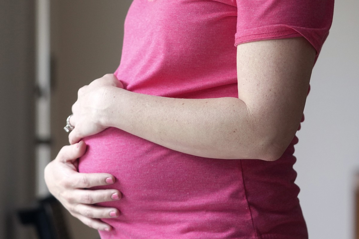 FILE - A pregnant woman stands for a portrait in Dallas, May 18, 2023. (AP Photo/LM Otero, File)
Immigration Birthright Citizenship