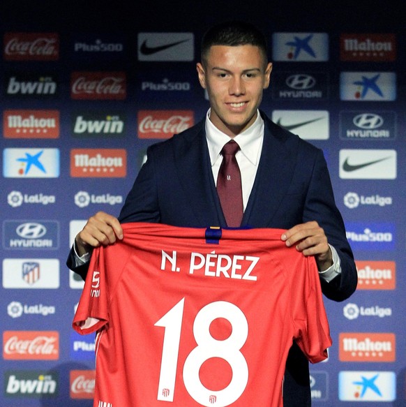 epa07401492 Atletico&#039;s new player Nehuen Perez poses for photographers during his presentation at Wanda Metropolitano stadium in Madrid, Spain, 27 February 2019. EPA/VICTOR LERENA