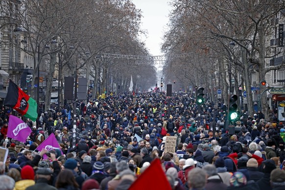 epa10415854 Protesters demonstrate during a national strike against the government&#039;s reform of the pension system, in Paris, France, 19 January 2023. The French government plans to delay the mini ...