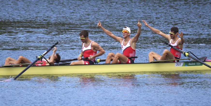 2016 Rio Olympics - Rowing - Final - Lightweight Men&#039;s Four Final A - Lagoa Stadium - Rio De Janeiro, Brazil - 11/08/2016. Lucas Tramer (SUI) of Switzerland, Simon Schurch (SUI) of Switzerland, S ...