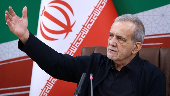epa13156863 A handout photo made available by the Iranian Presidential Office shows Iranian President Masoud Pezeshkian attending a press conference in Tehran, Iran, 08 August 2026, on the occasion of ...