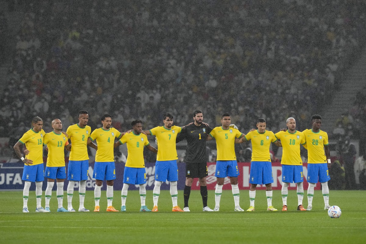 Brazil's soccer team poses for a photo before start of a friendly match at the National Stadium in Tokyo Monday, June 6, 2022. (AP Photo/Eugene Hoshiko)