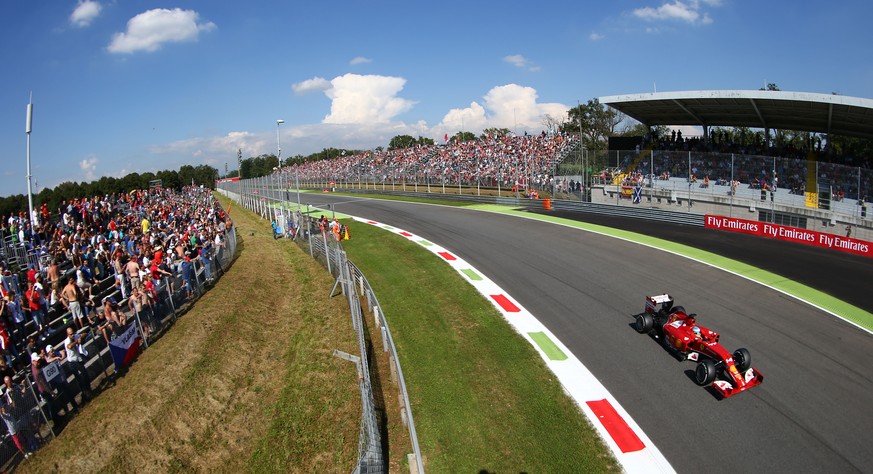 Spain&#039;s Fernando Alonso steers his Ferrari during the quantifying session at the Monza racetrack, in Monza, Italy , Saturday, Sept. 6 , 2014. The Formula one race will be held on Sunday. (AP Phot ...