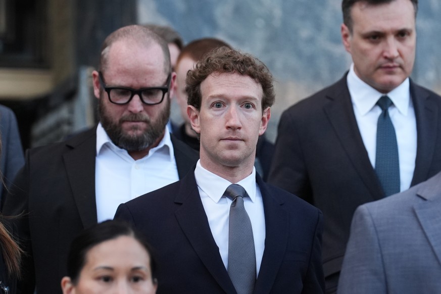 Meta CEO Mark Zuckerberg leaves after testifying in a landmark trial over whether social media platforms deliberately addict and harm children, Wednesday, Feb. 18, 2026, in Los Angeles. (AP Photo/Dami ...