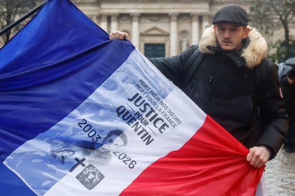 epa12744144 A French flag reading 'Justice for Quentin', displayed during a rally to pay tribute to the 23-year-old student killed in Lyon Quentin, in place de la Sorbonne, Paris, France, 15 ...