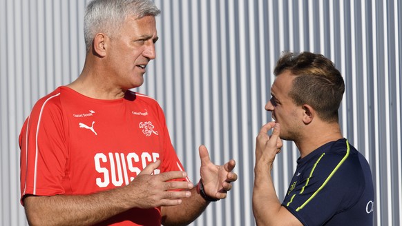 Switzerland&#039;s head coach Vladimir Petkovic, left, speaks with Switzerland&#039;s midfielder Xherdan Shaqiri, right, during a training session of the Switzerland&#039;s national soccer team at the ...