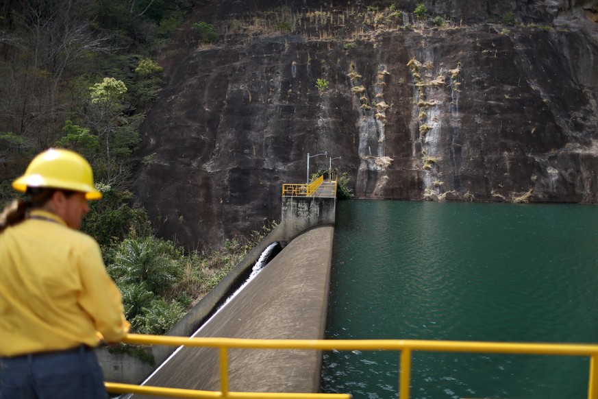 GUANACASTE, COSTA RICA - MARCH 26: Carlos Manuel Quiros stands near a dam at a hydroelectric plant run by the Costa Rican Electricity Institute (ICE) as the power company has managed to produce all of ...